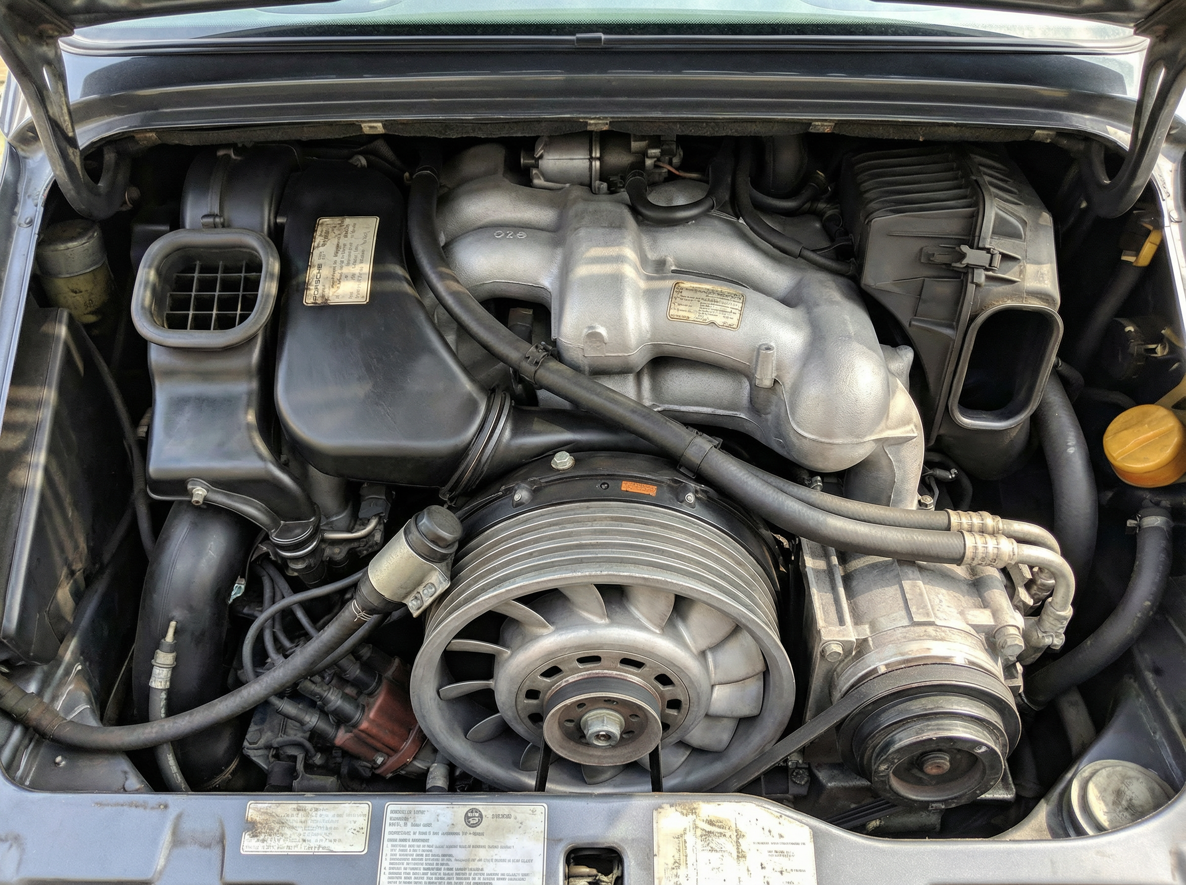 Porsche 993 engine bay after dry ice blasting — factory-clean casting, Canyon Dry Ice Blasting