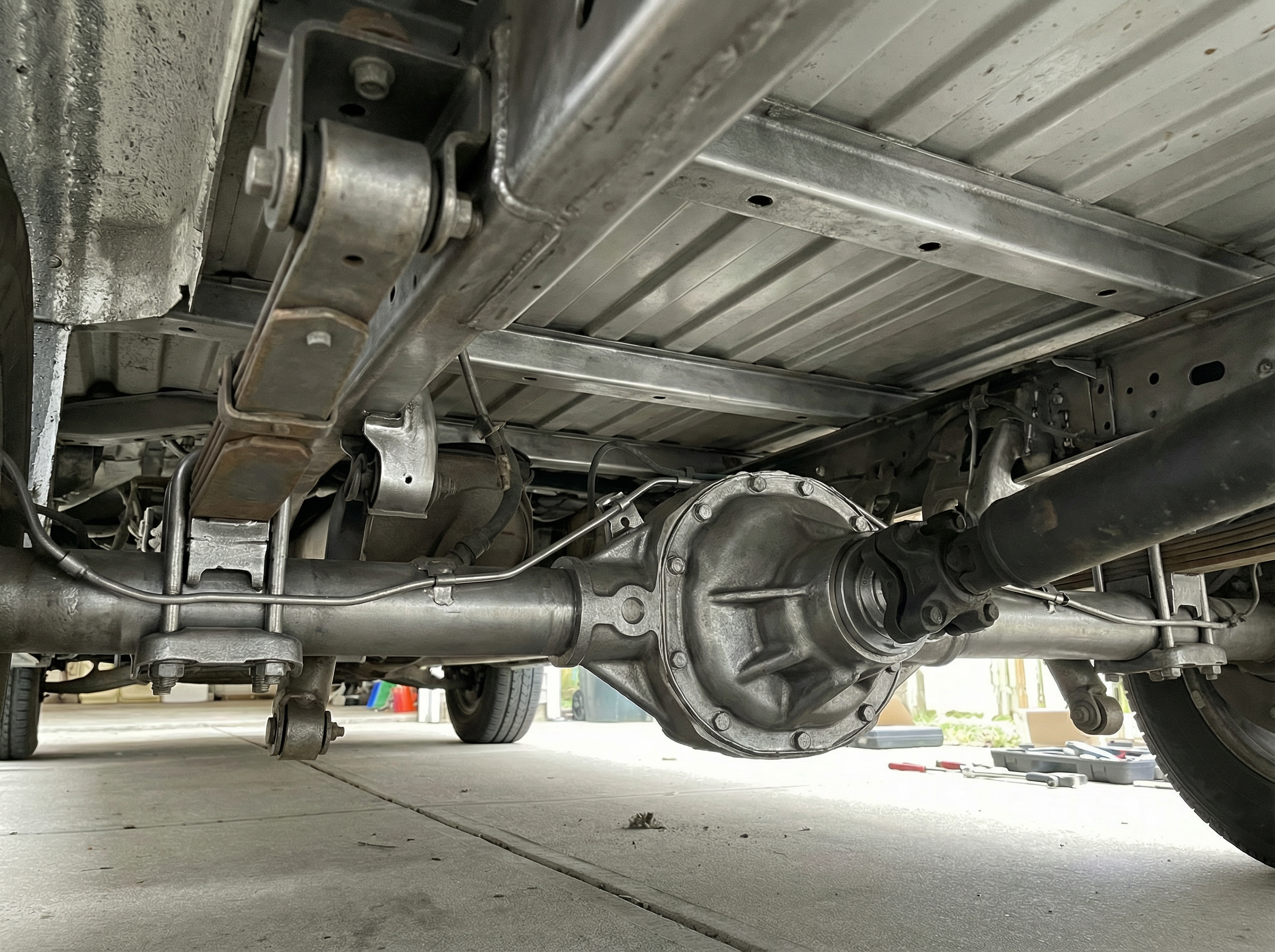 Commercial fleet van underbody after dry ice blasting — clean frame and suspension, Canyon Dry Ice Blasting